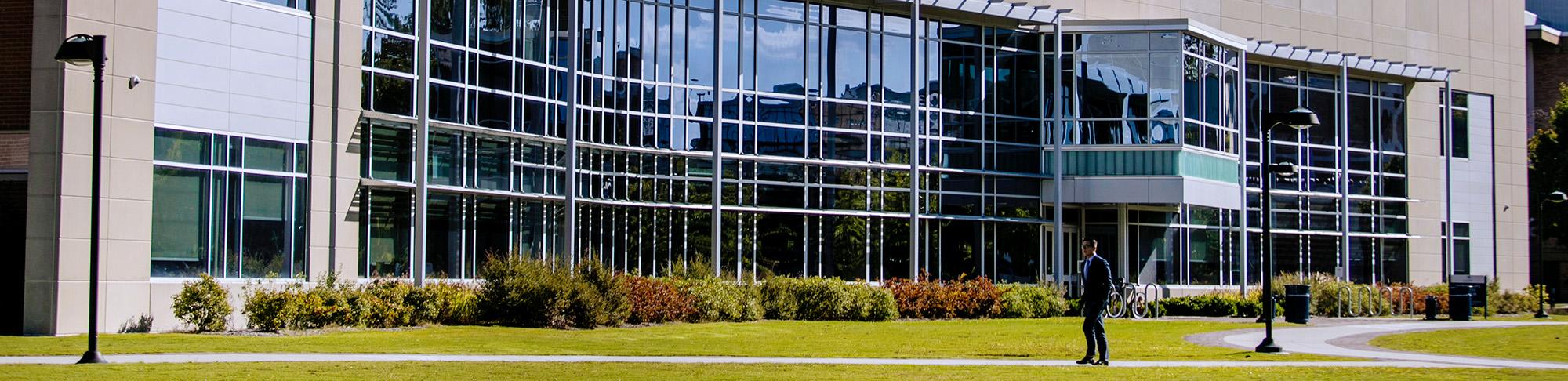 Students walking by Engineering Systems Building.