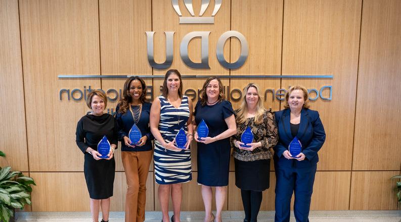 From left: Lisa Duncan Raines, Aileen Smith, Renee Garrett, Cathy Rossi, Shantell Strickland-Davis and Tina Manglicmot hold their awards.